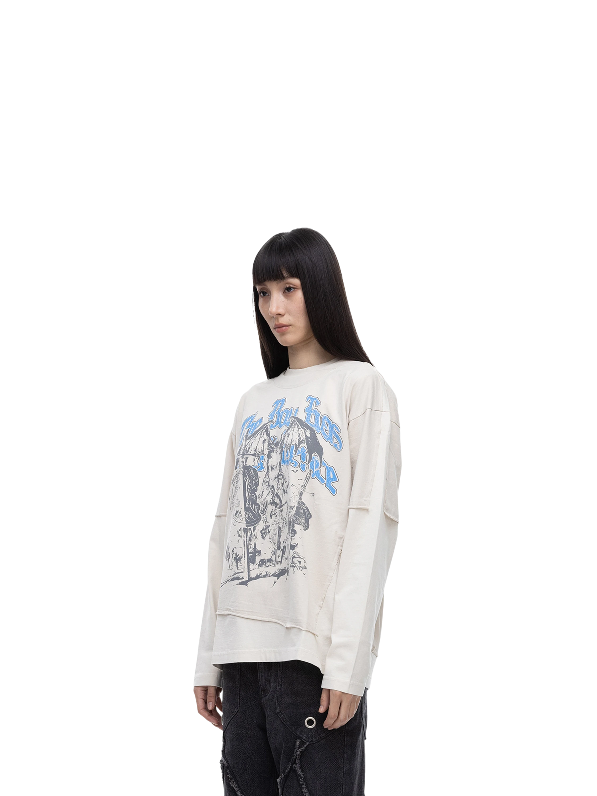 Female model styling TBHNP grayish-yellow knight long-sleeve tee, front detail — men's streetwear tee