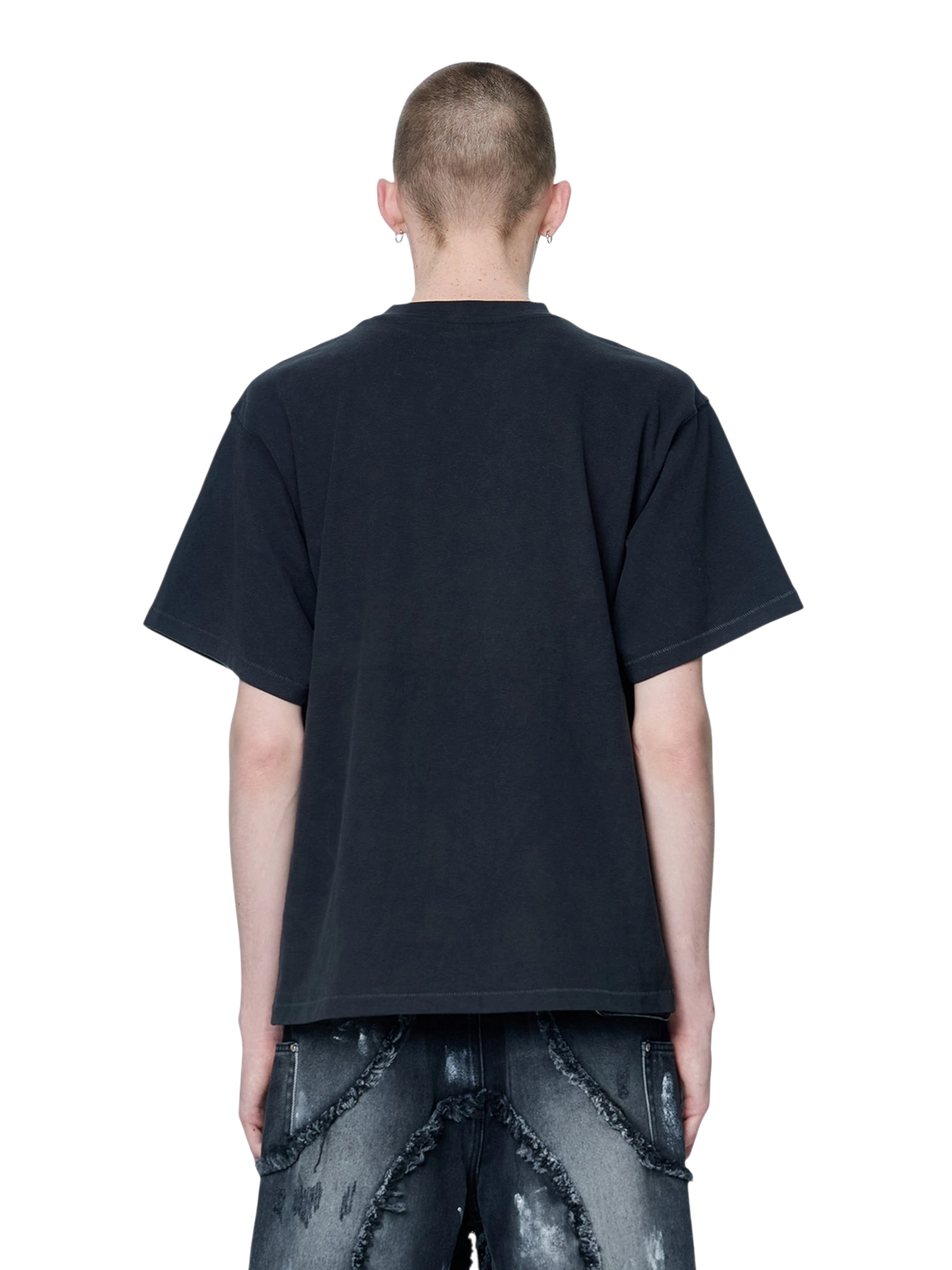 Model wearing TBHNP dark grey Knight & Sword tee, back view — men's streetwear tee