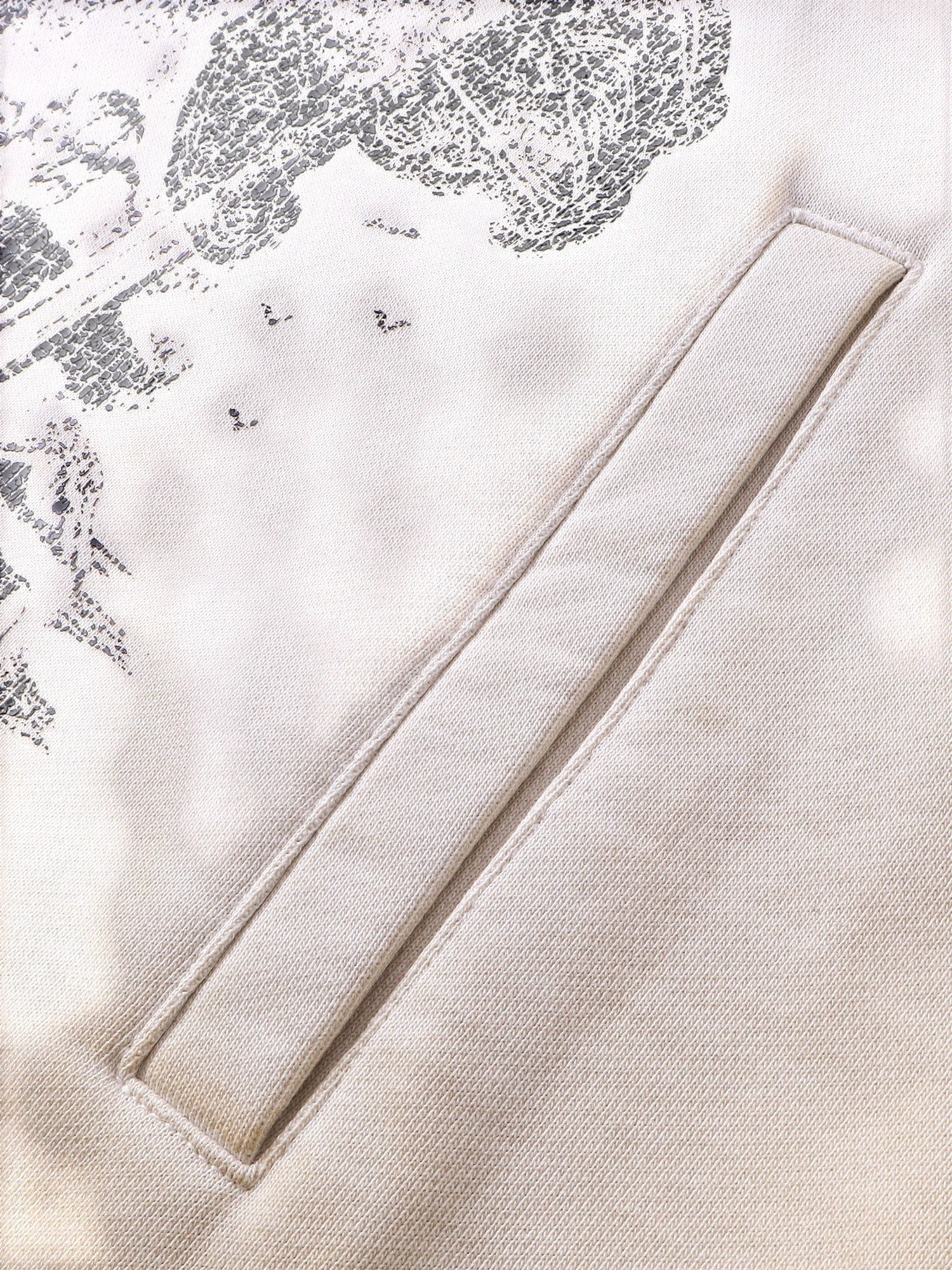 Close-up of the side pocket on TBHNP grayish-yellow knight hoodie — men's streetwear detail