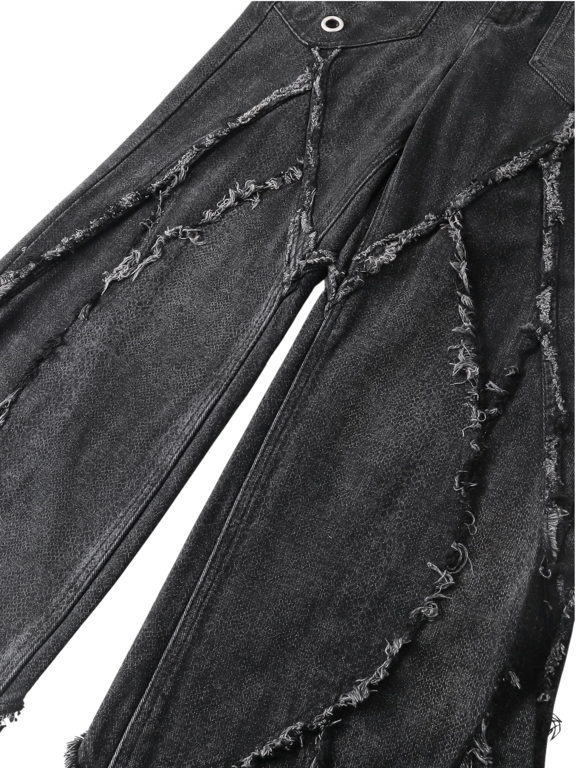 Close-up of the waistband and pocket on TBHNP black baggy jeans — men's streetwear detail