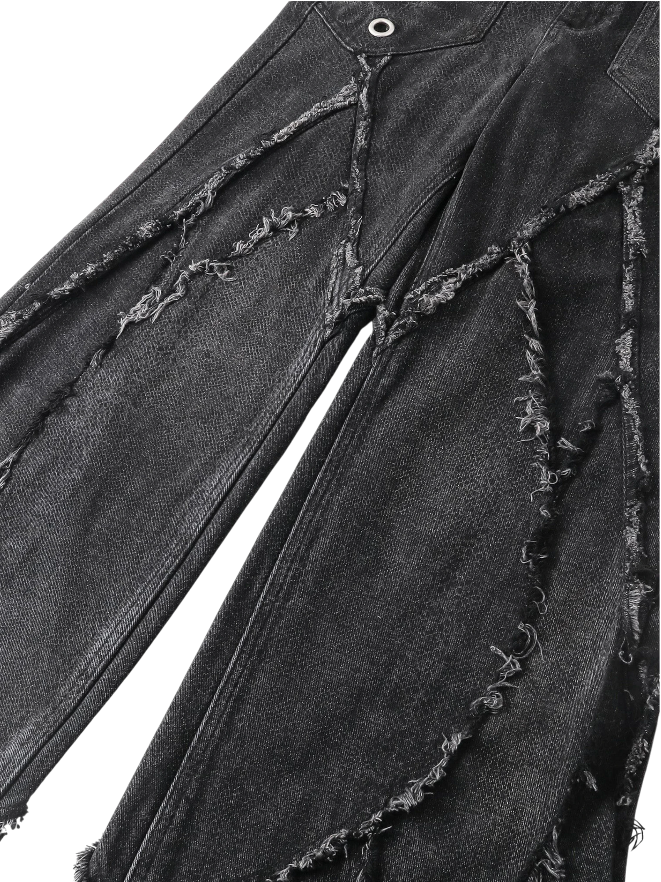 Close-up of the waistband and pocket on TBHNP black baggy jeans — men's streetwear detail