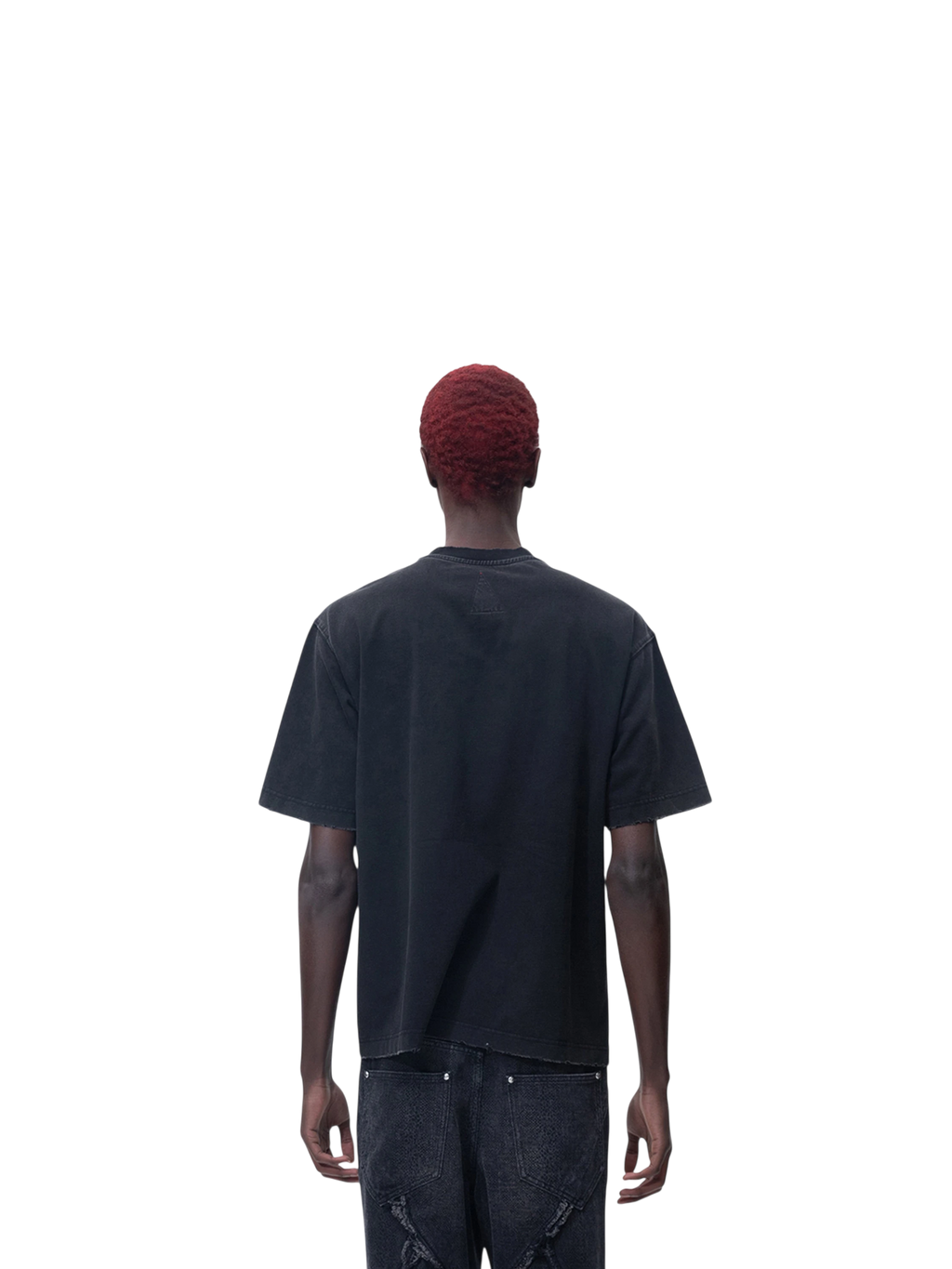 Model in TBHNP black arrival short-sleeve tee, front view — men's streetwear tee