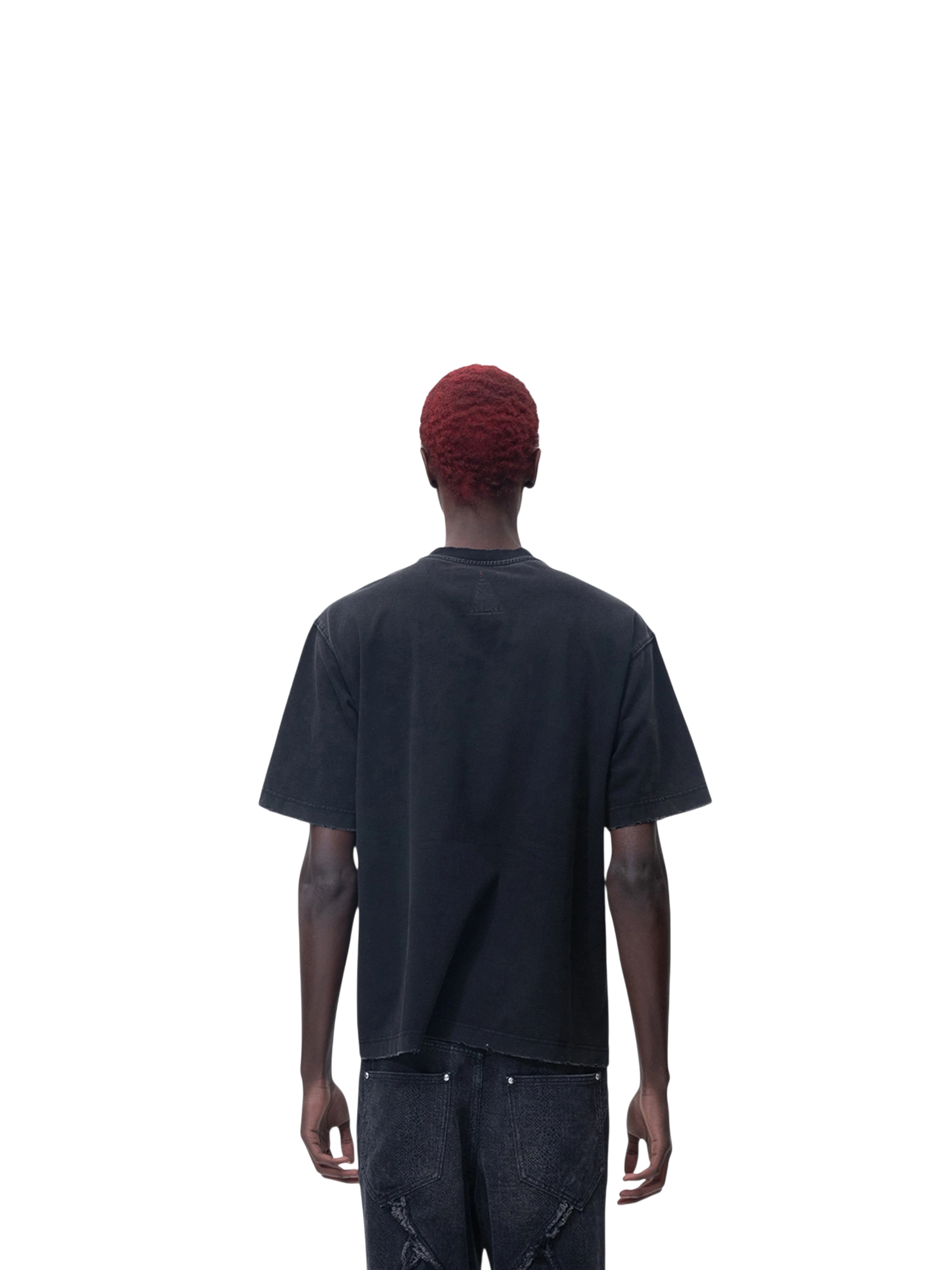 Model in TBHNP black arrival short-sleeve tee, front view — men's streetwear tee