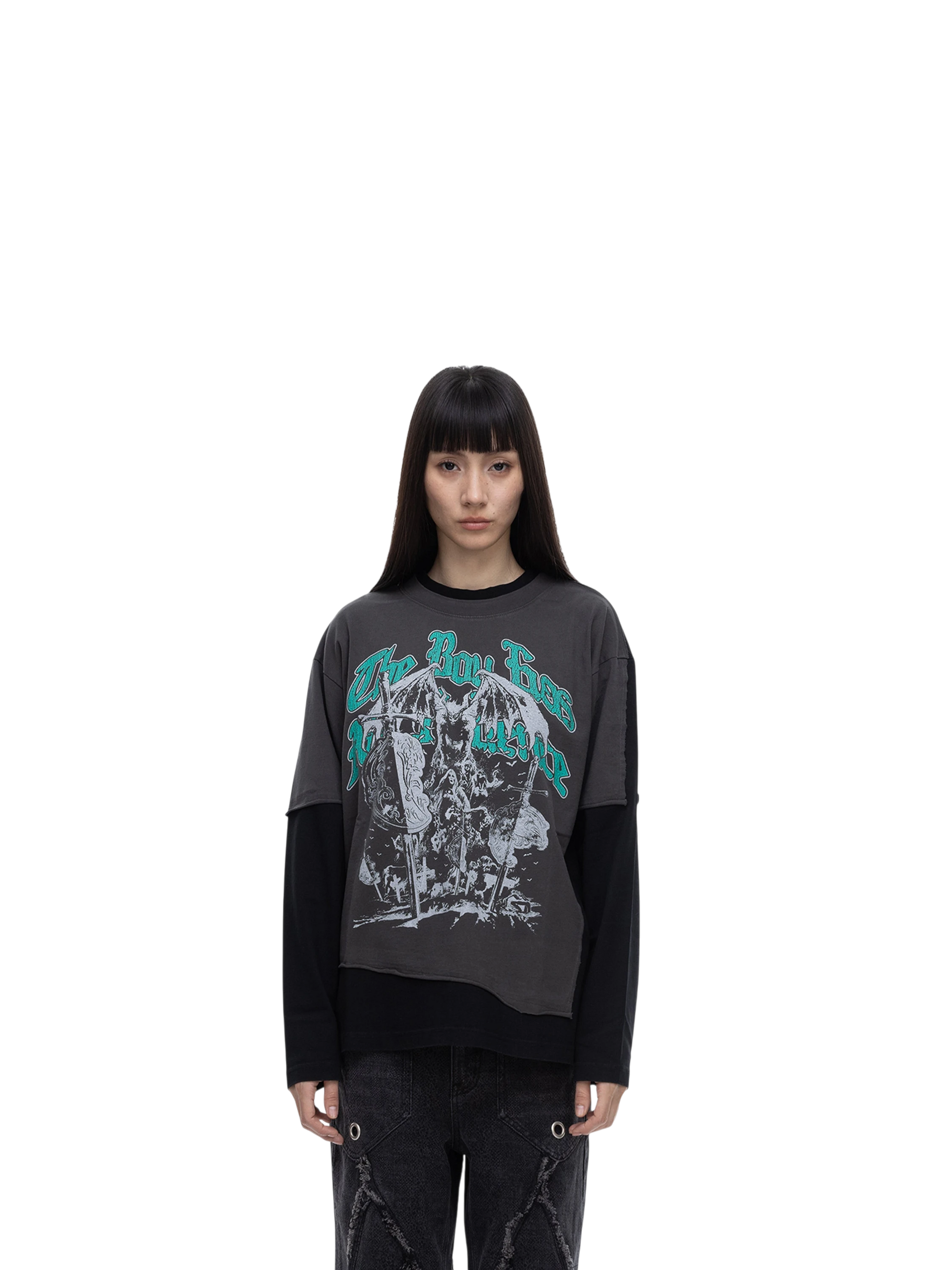 Female model wearing TBHNP black arrival knight long-sleeve tee, front — men's streetwear