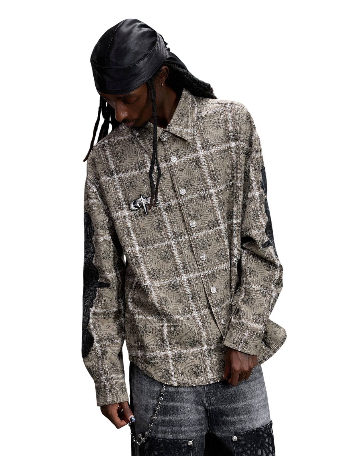 Model wearing the plaid shirt open as a layered overshirt.