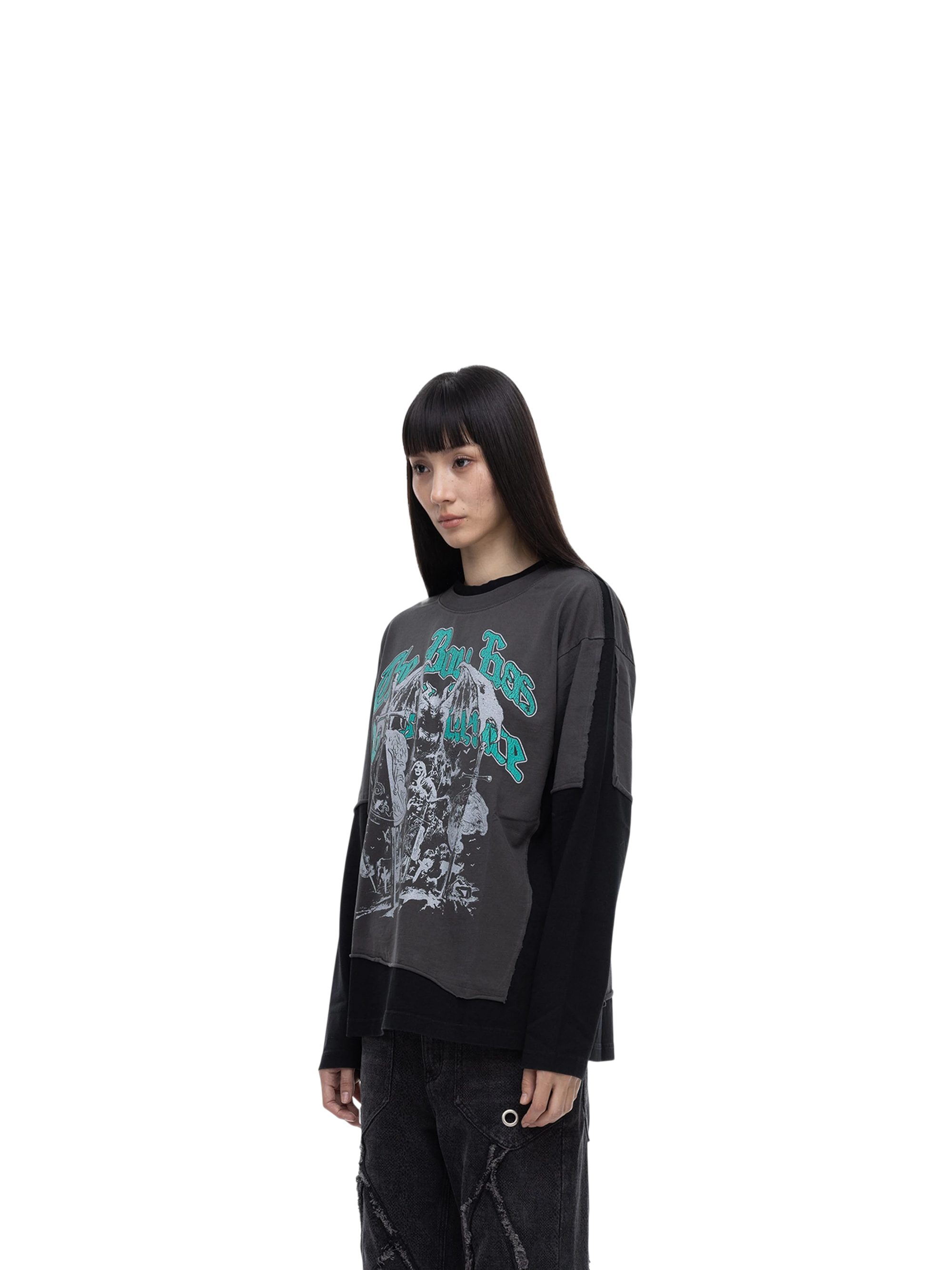 Female model styling TBHNP black knight long-sleeve tee, front detail — men's streetwear tee