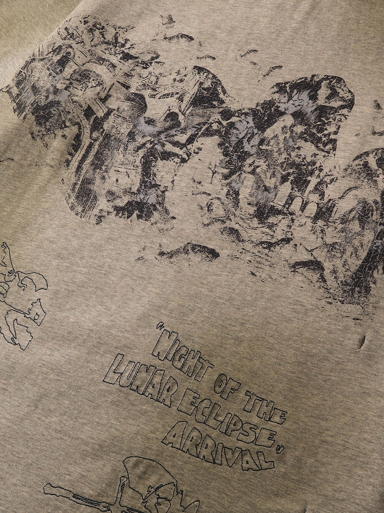 Close-up of the distressed print on TBHNP floral-grey arrival tee — men's streetwear detail