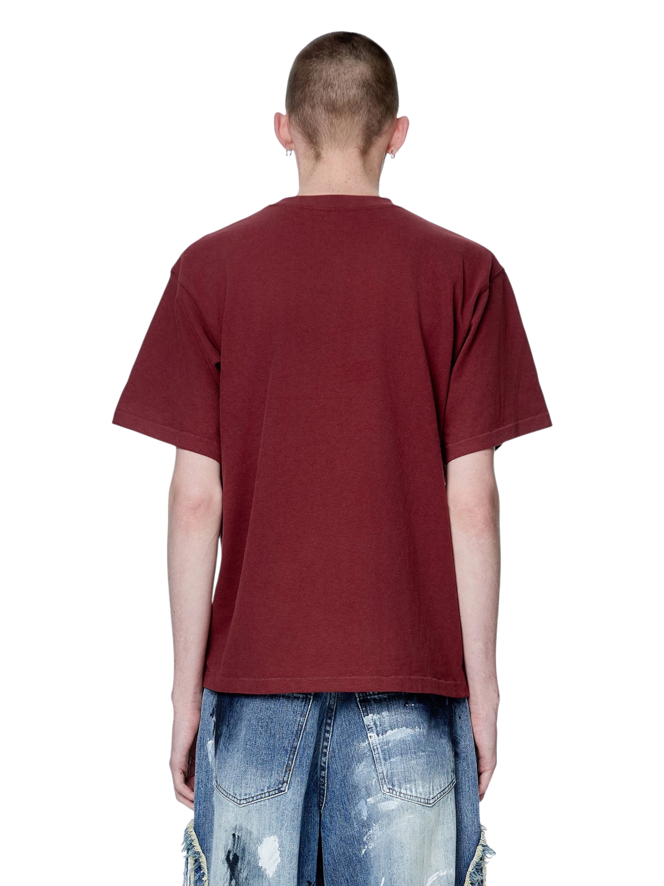 Model wearing TBHNP red Knight & Sword tee, back view — men's streetwear tee