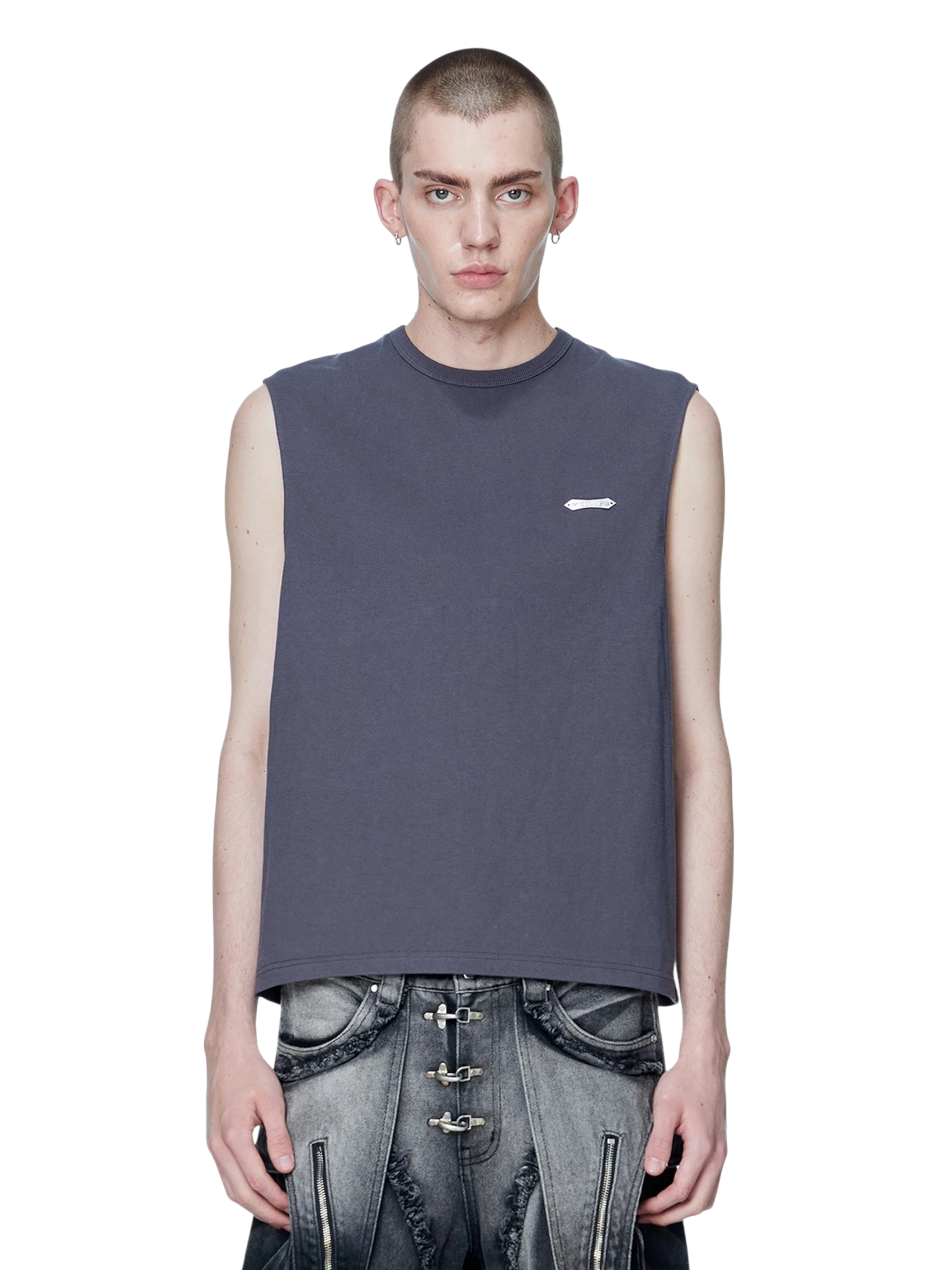 Model wearing TBHNP dark grey Astral Logo Shadowbat vest, front — men's streetwear sleeveless tee