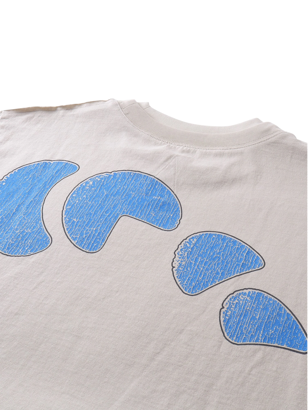 Close-up of the knight engraving print on TBHNP grayish-yellow tee — men's streetwear detail