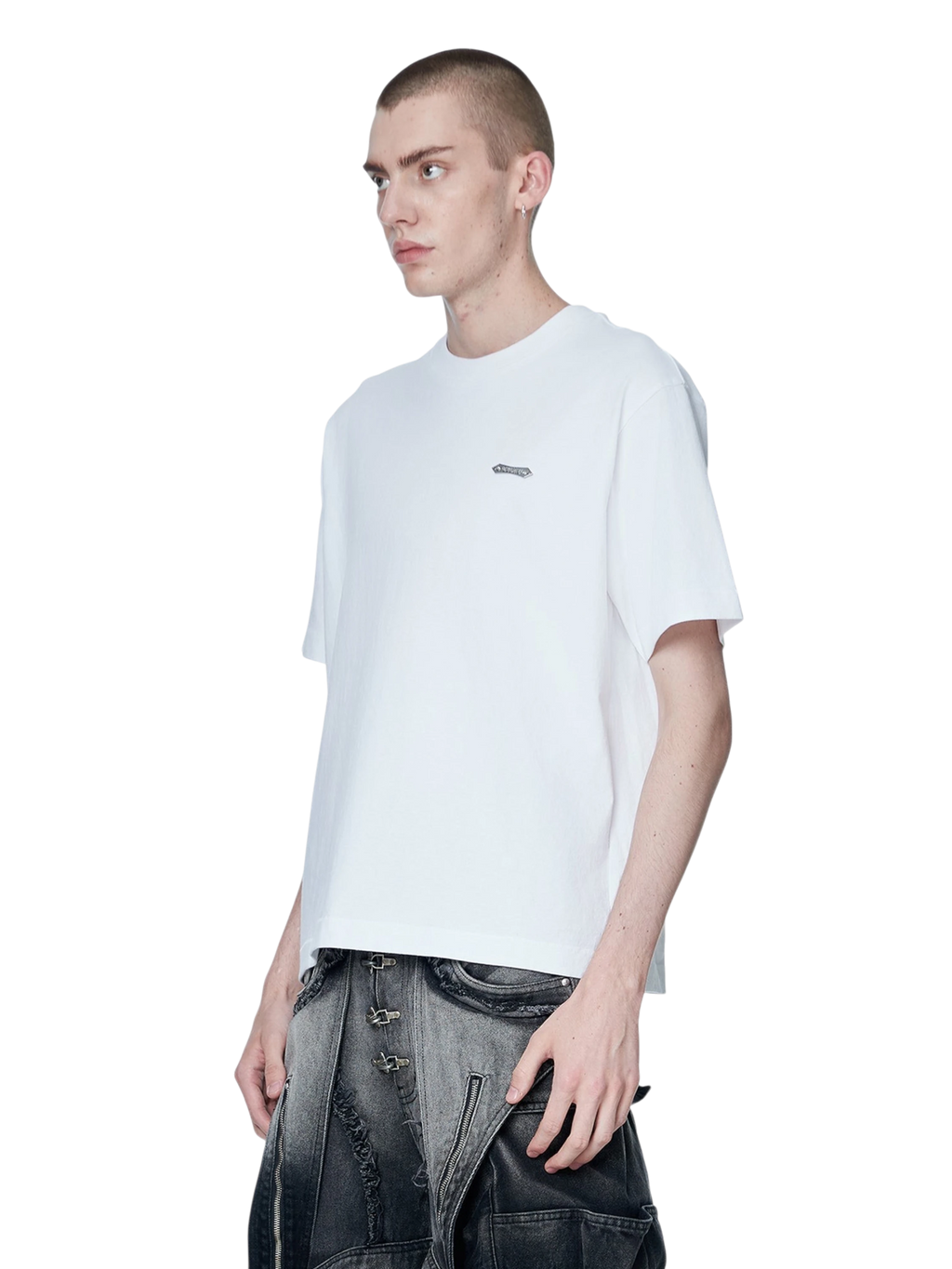 Model styling TBHNP white Emblem & Shadowbat tee, front detail — men's streetwear tee