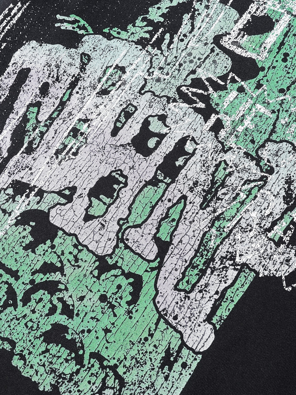 Close-up of the green Wraith Sorcerer print on TBHNP black tee — men's streetwear detail