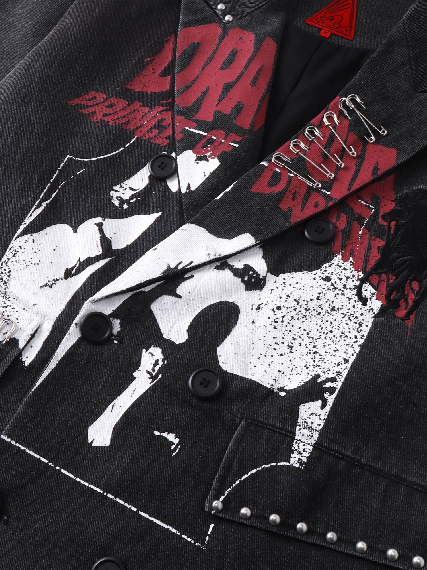 Close-up of the white-and-red front screen print on TBHNP spray-painted blazer — men's streetwear detail