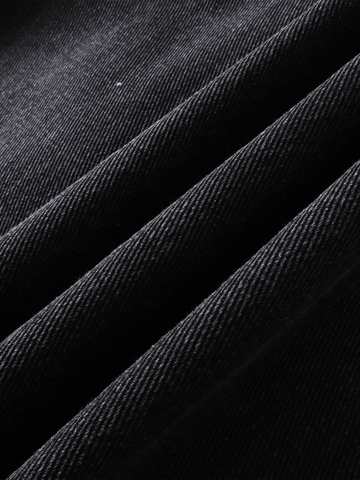 Close-up of the heavyweight cotton fabric on TBHNP Prince of Darkness blazer — men's streetwear detail