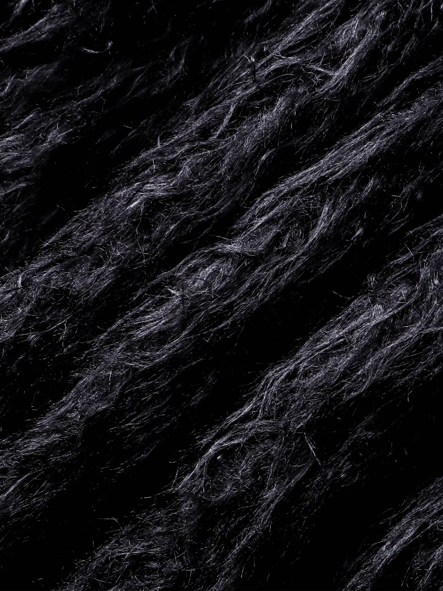 Close-up of the plush faux-fur texture on TBHNP Eclipse bomber jacket — men's streetwear detail