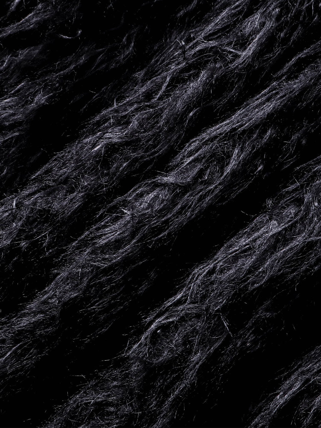 Close-up of the plush faux-fur texture on TBHNP Eclipse bomber jacket — men's streetwear detail