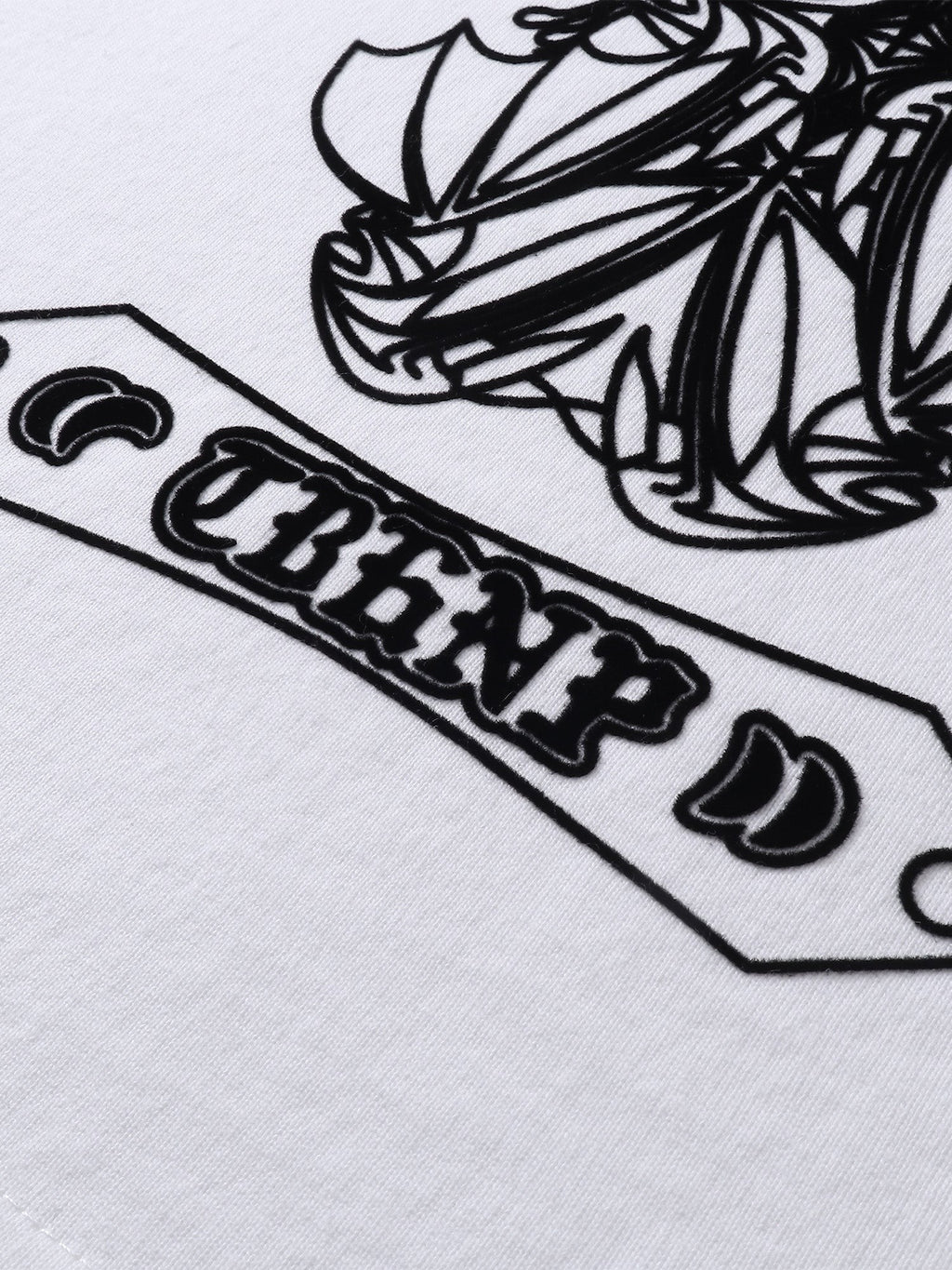 Close-up of the flocked emblem print detail on TBHNP Shadowbat vest — men's streetwear detail