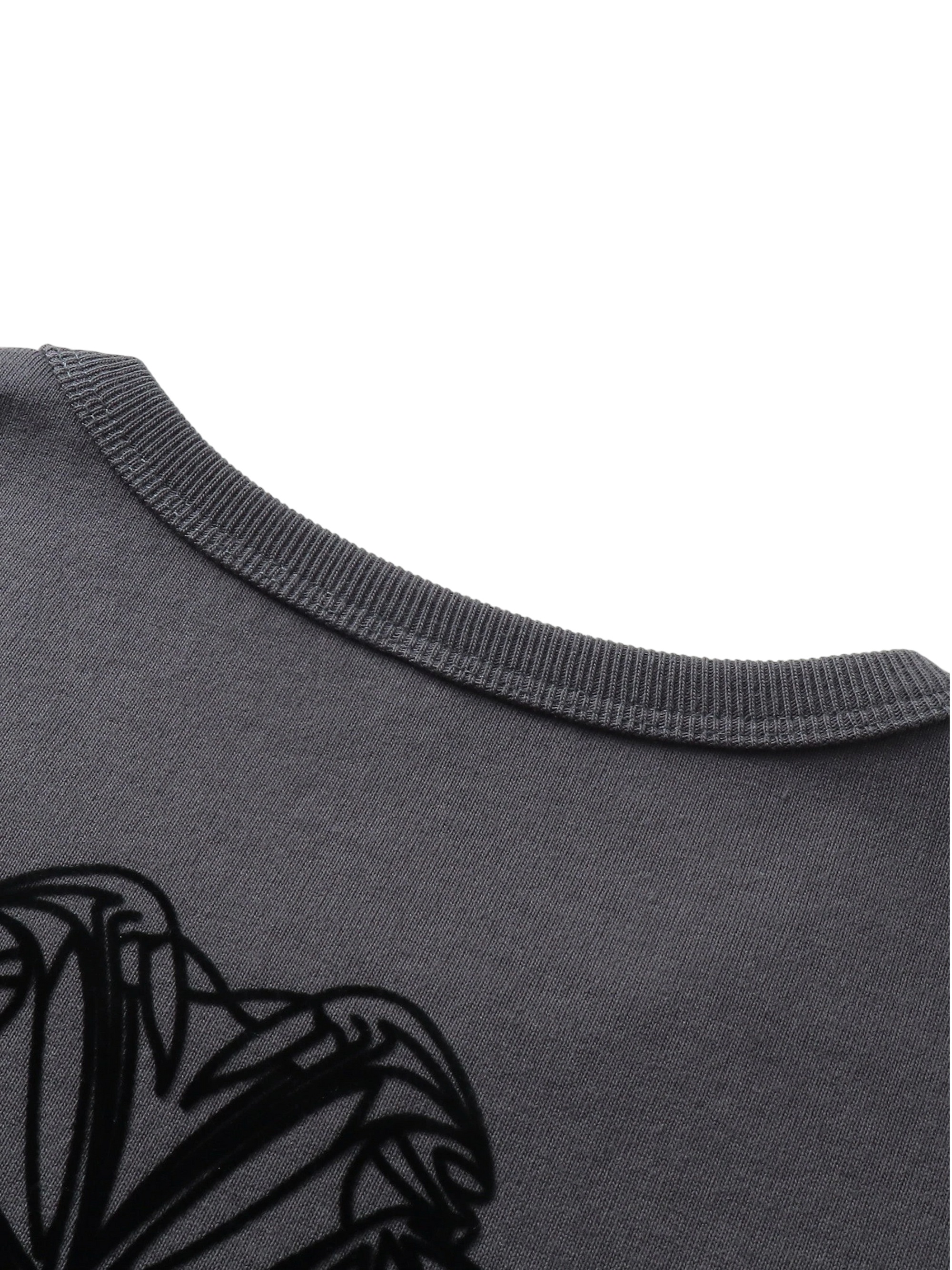 Close-up of the crew neck and label on TBHNP dark grey Shadowbat vest — men's streetwear detail
