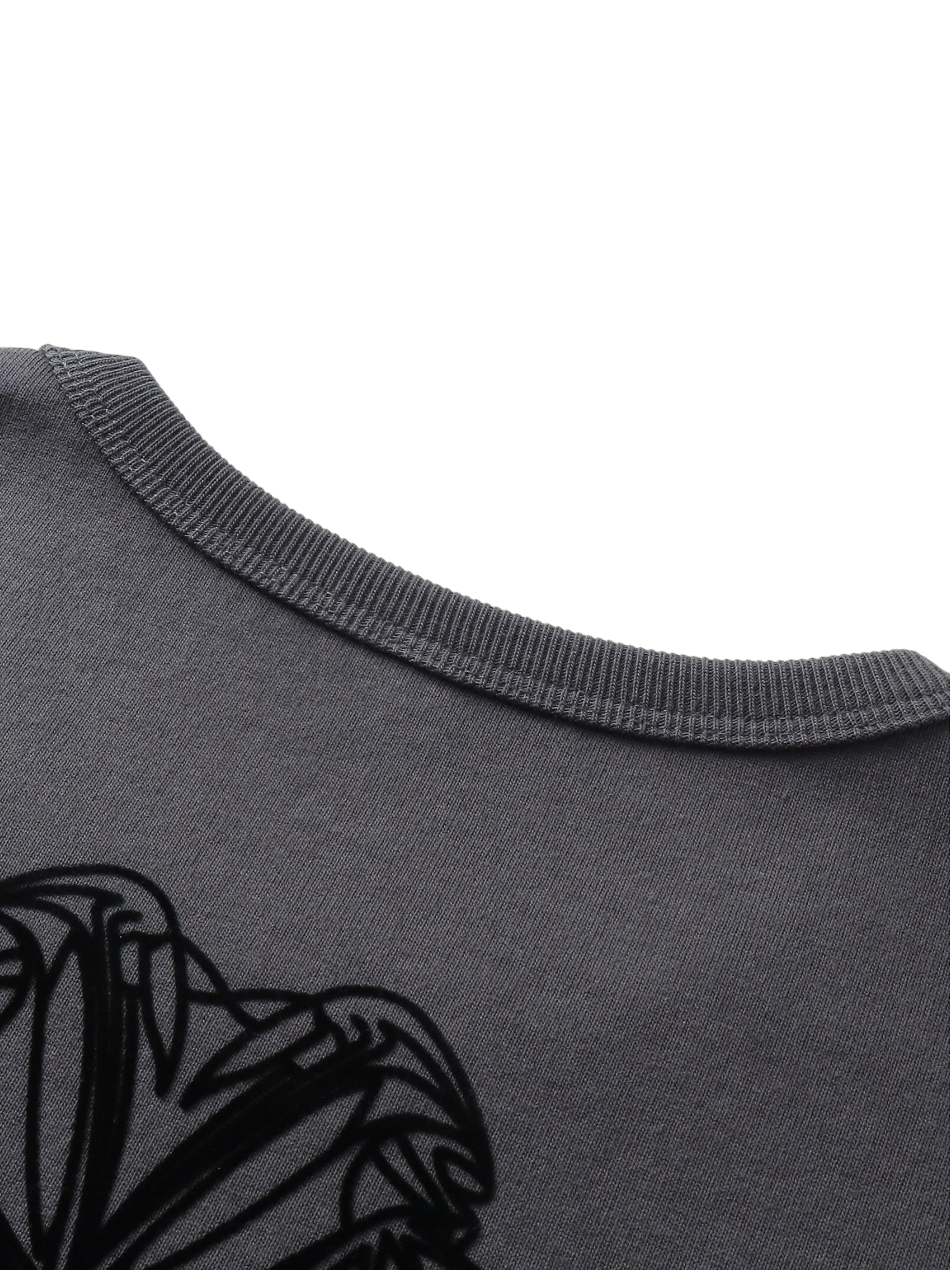 Close-up of the crew neck and label on TBHNP dark grey Shadowbat vest — men's streetwear detail