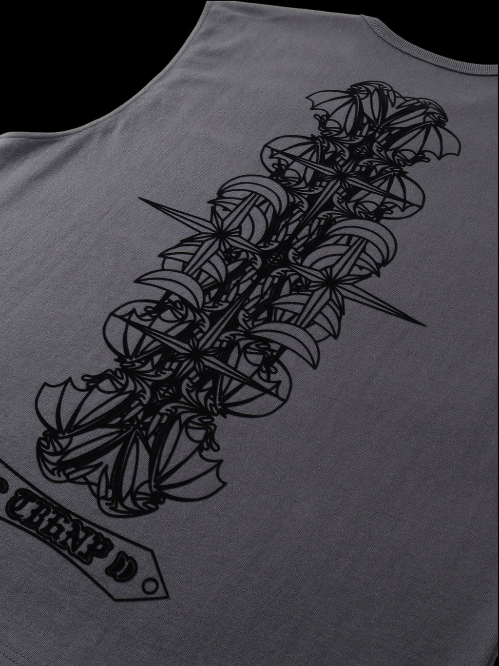Close-up of the cotton fabric on TBHNP dark grey Shadowbat vest — men's streetwear detail