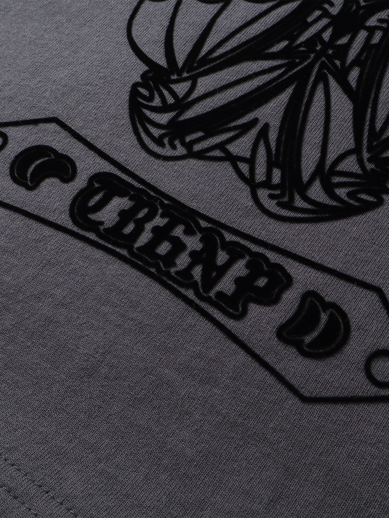 Close-up of the shadowbat print detail on TBHNP dark grey Shadowbat vest — men's streetwear detail