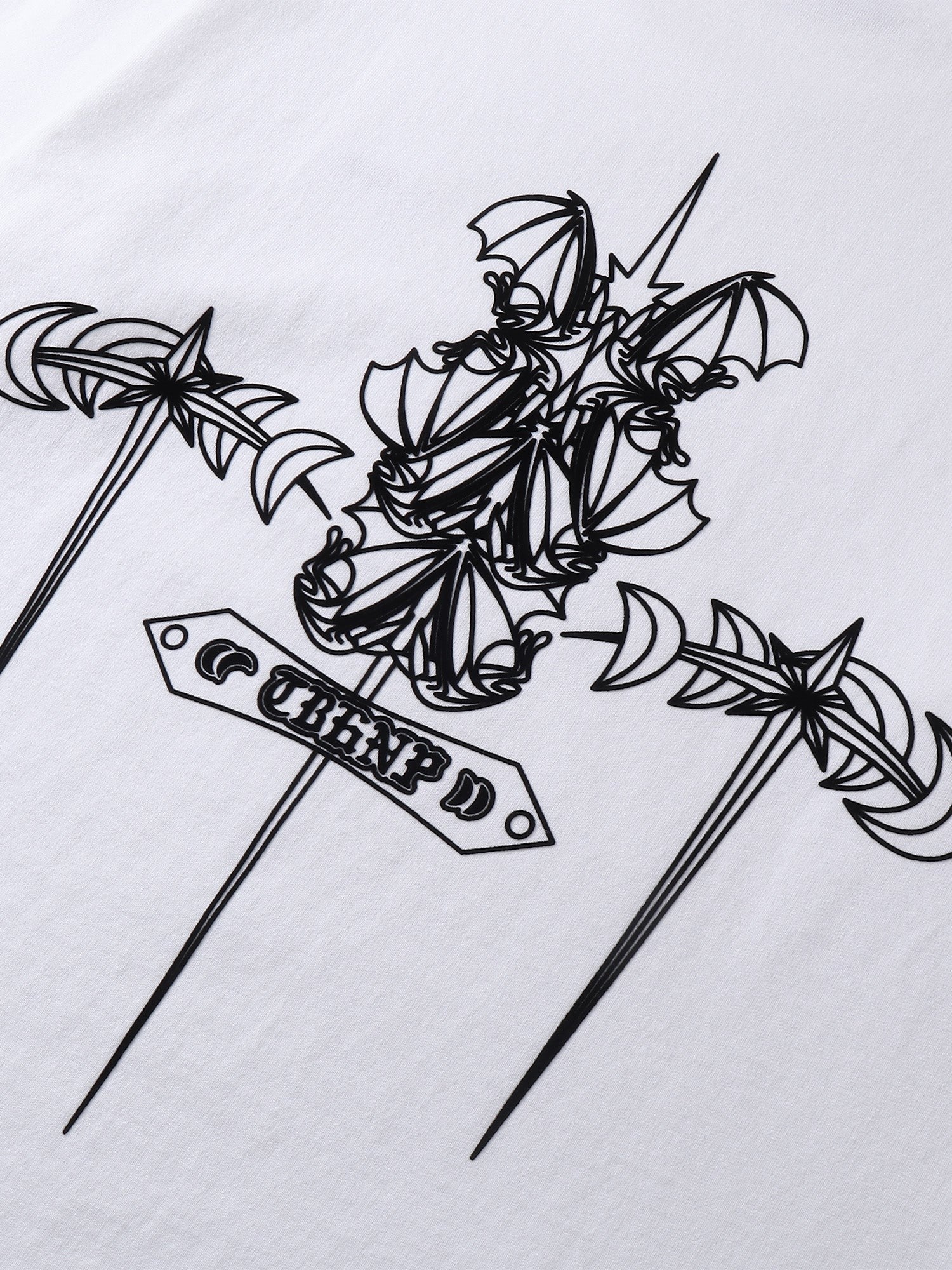 Close-up of the emblem print detail on TBHNP Emblem & Shadowbat tee — men's streetwear detail