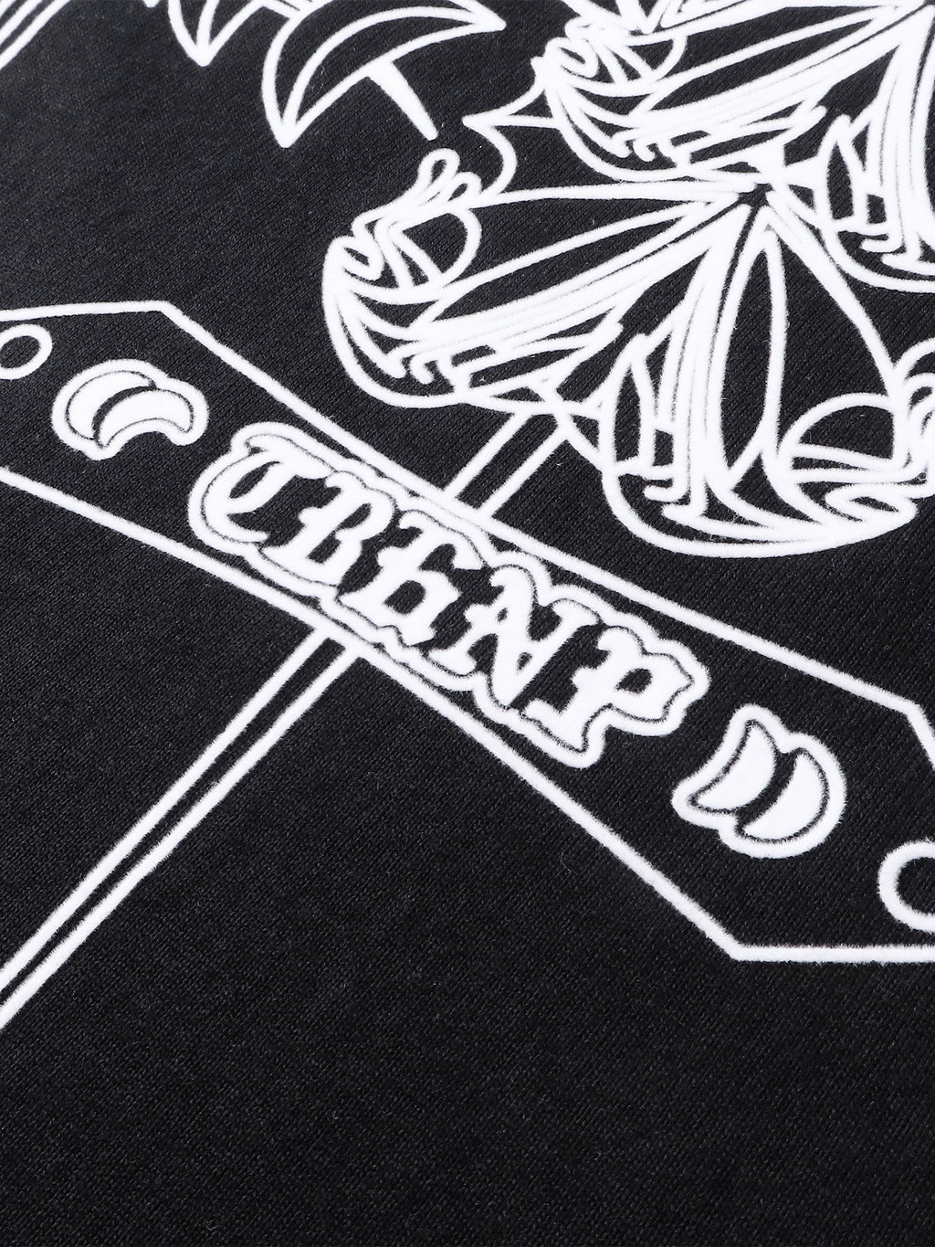Close-up of the emblem and shadowbat back print on TBHNP black tee — men's streetwear detail