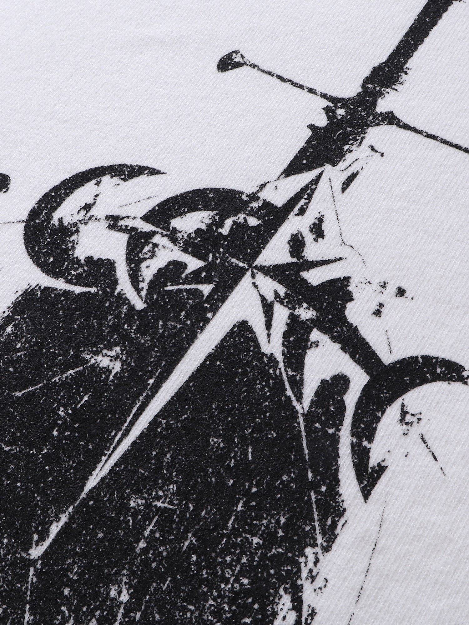 Close-up of the knight sword-and-shield print on TBHNP white tee — men's streetwear detail