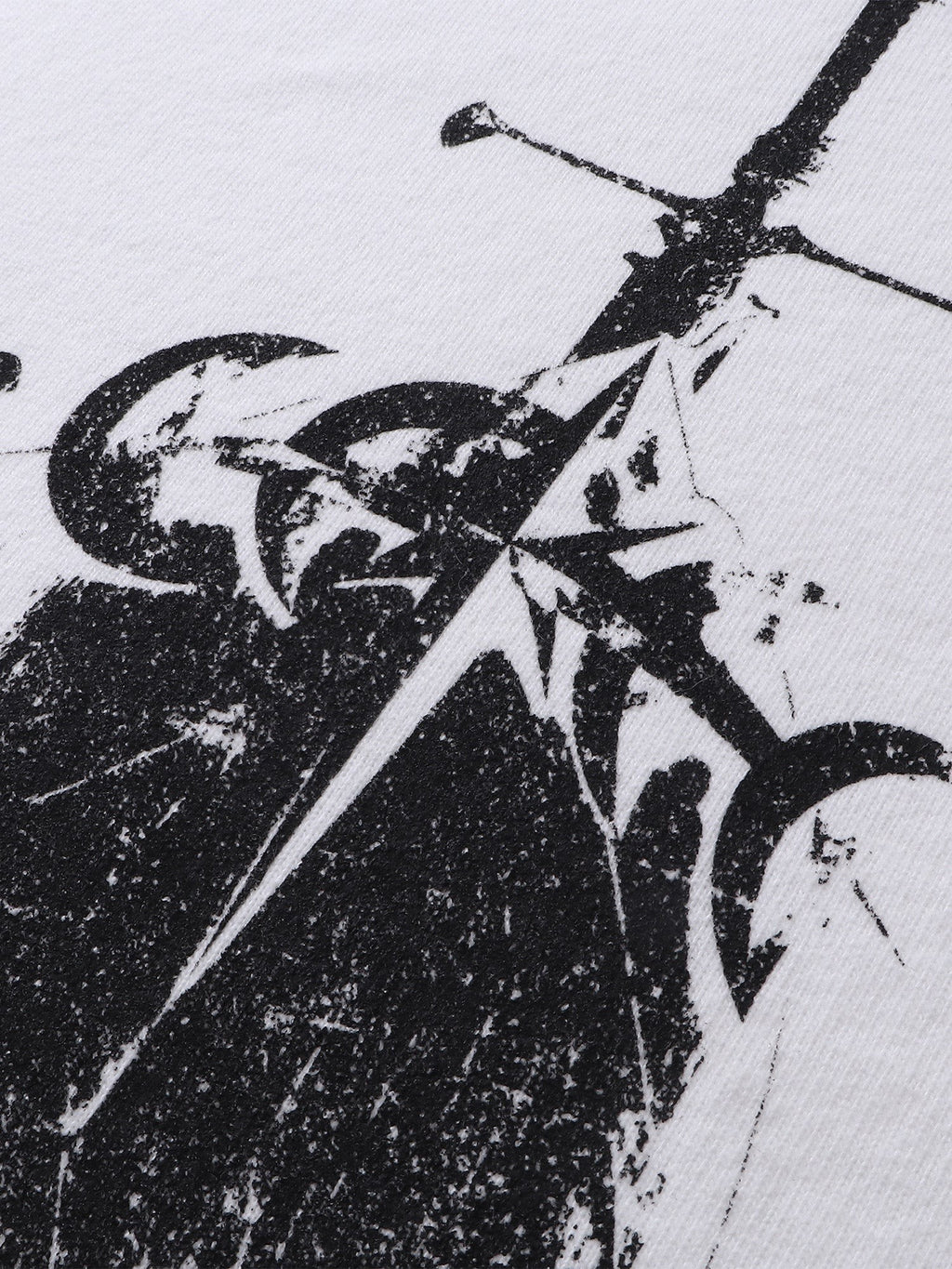 Close-up of the knight sword-and-shield print on TBHNP white tee — men's streetwear detail