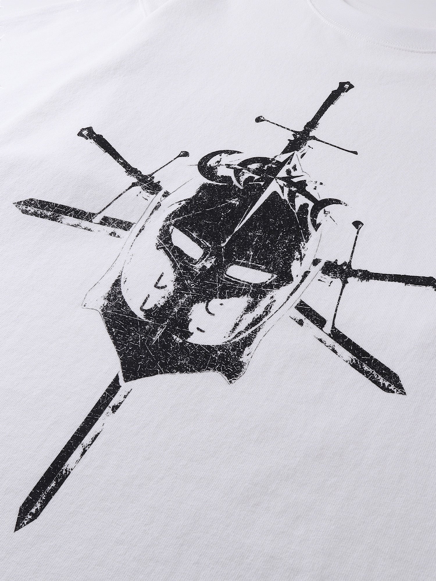 Close-up of the distressed knight print on TBHNP white tee — men's streetwear detail