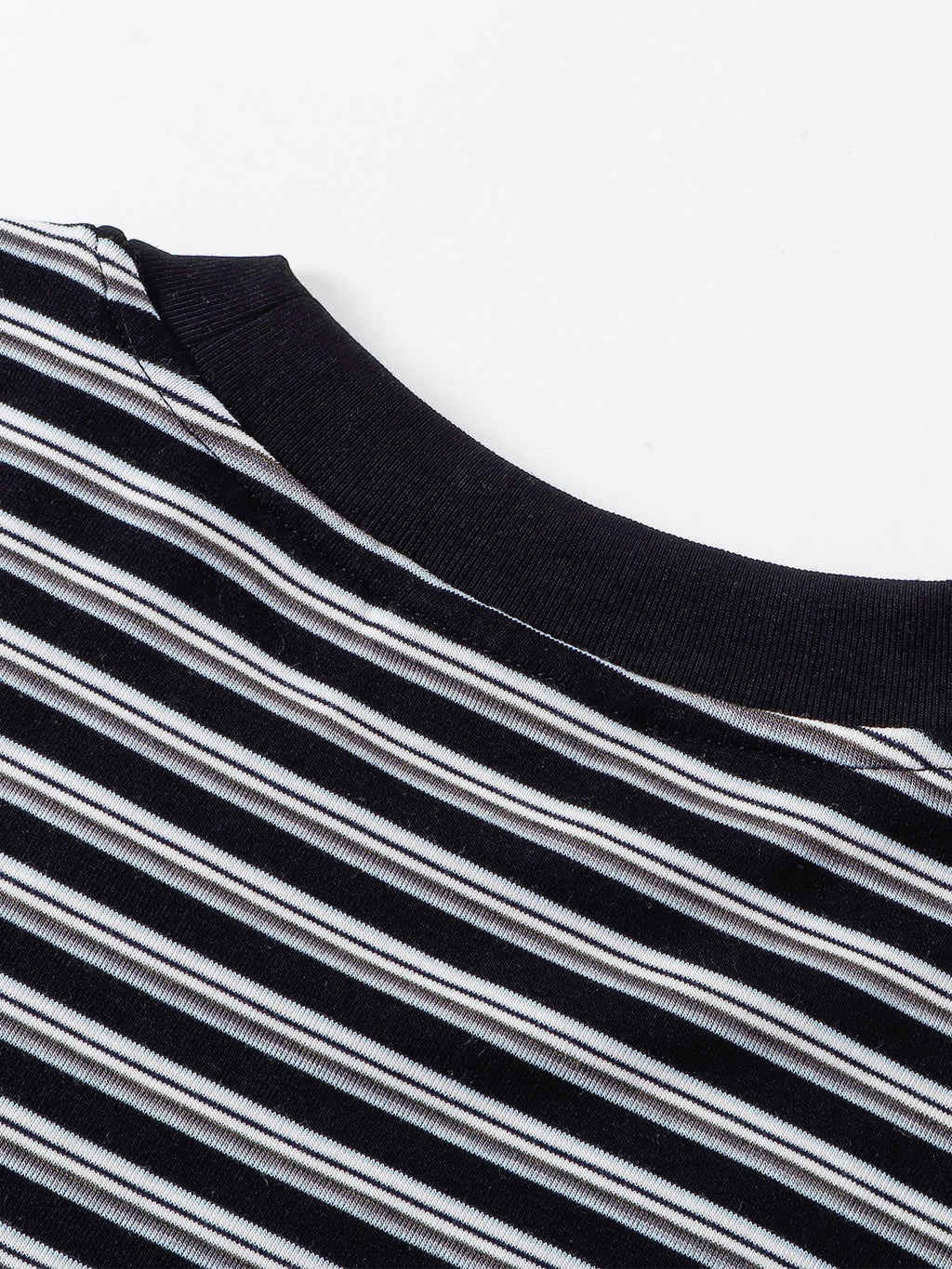 Black Luminous Dawn tee, fabric texture detail