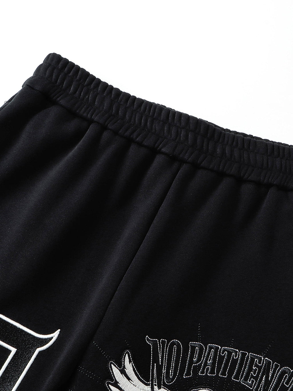 Black sweatpants elastic waistband and drawstring detail