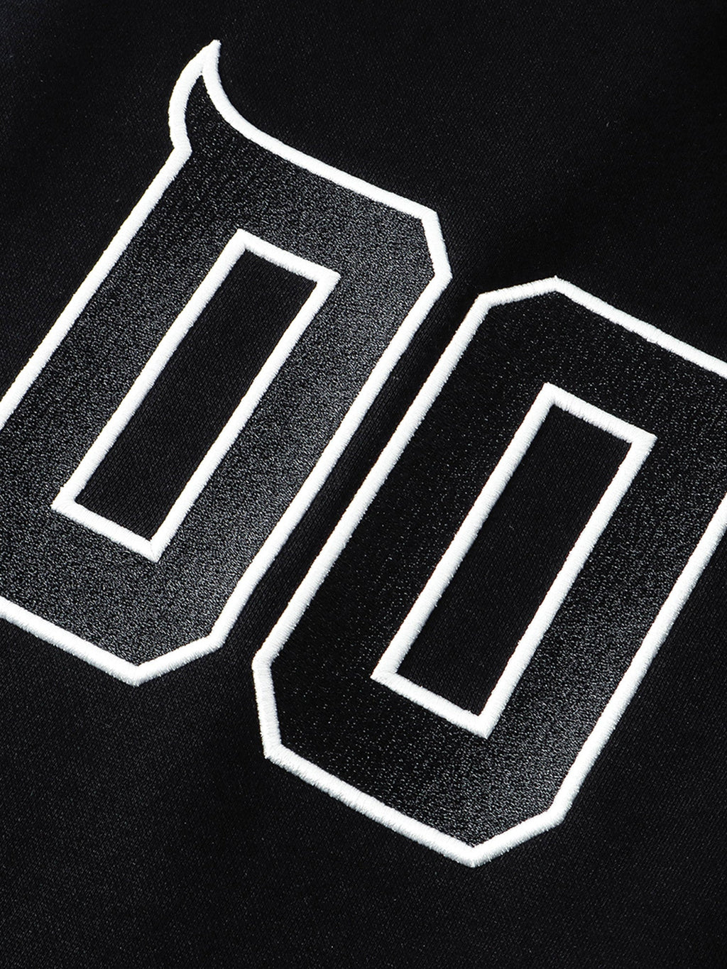 Outlined varsity numeral patch on black sweatpants