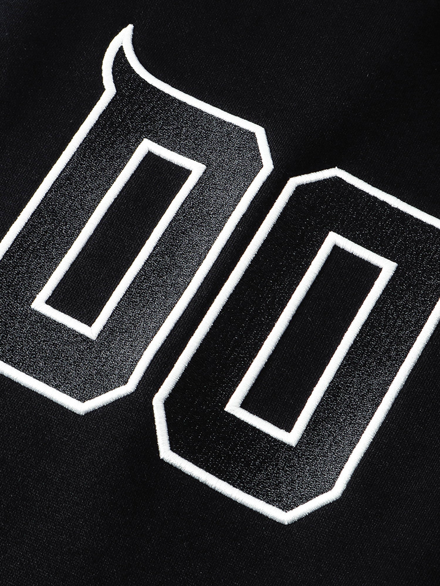 Outlined varsity numeral patch on black sweatpants