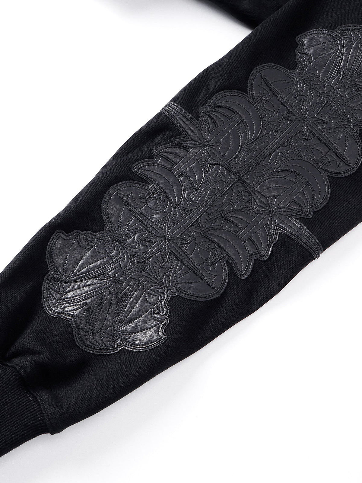 Close-up of the Grey Blue hoodie chest patch and zipper.