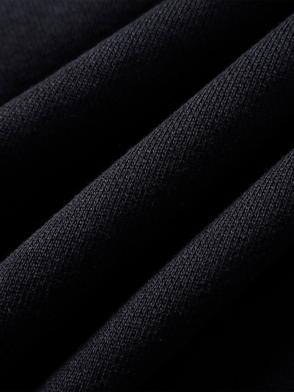 Close-up of the Grey Blue hoodie cuff and sleeve appliqué.