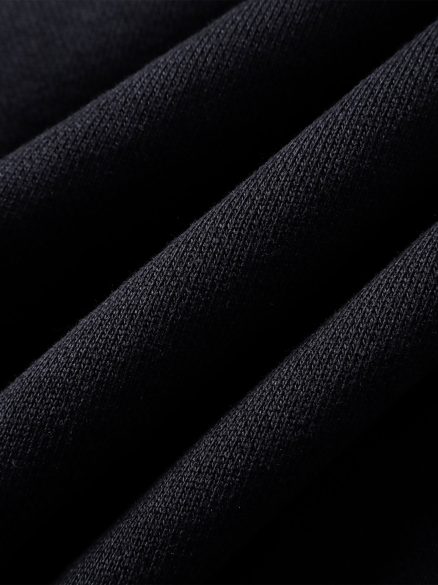 Close-up of the Grey Blue hoodie cuff and sleeve appliqué.