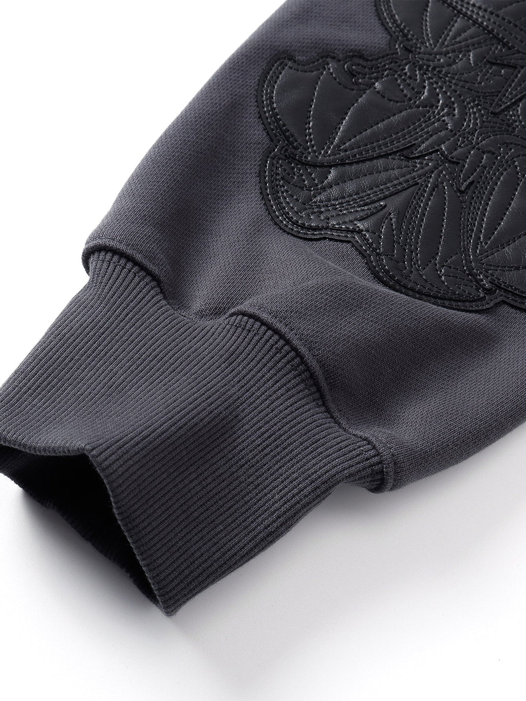 Close-up of the Black hoodie hood and neckline construction.