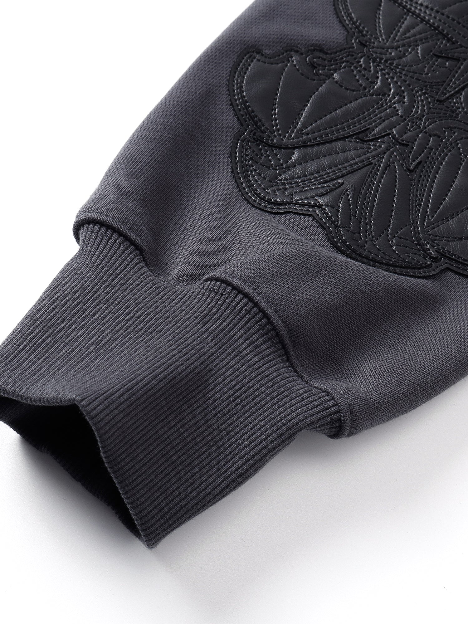 Close-up of the Black hoodie hood and neckline construction.