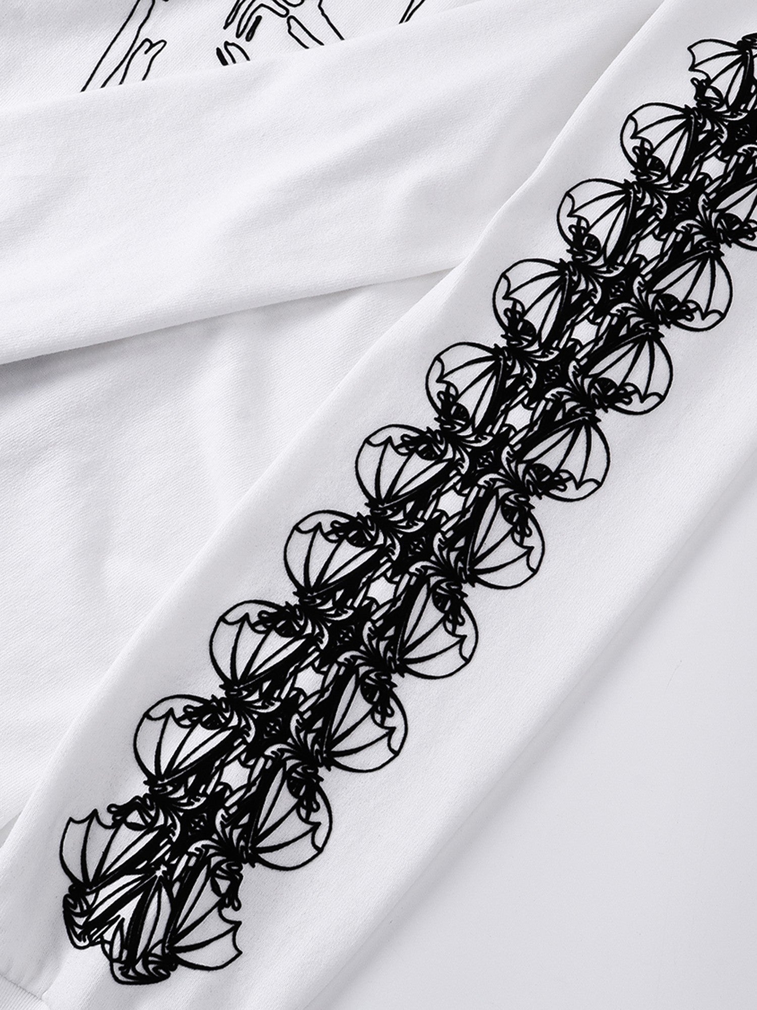 Black flocked sleeve artwork on Off White long-sleeve tee