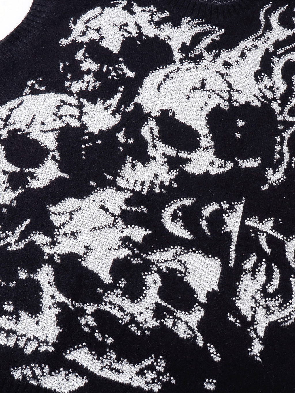 Close-up of the jacquard wraith motif and rhinestone detailing.