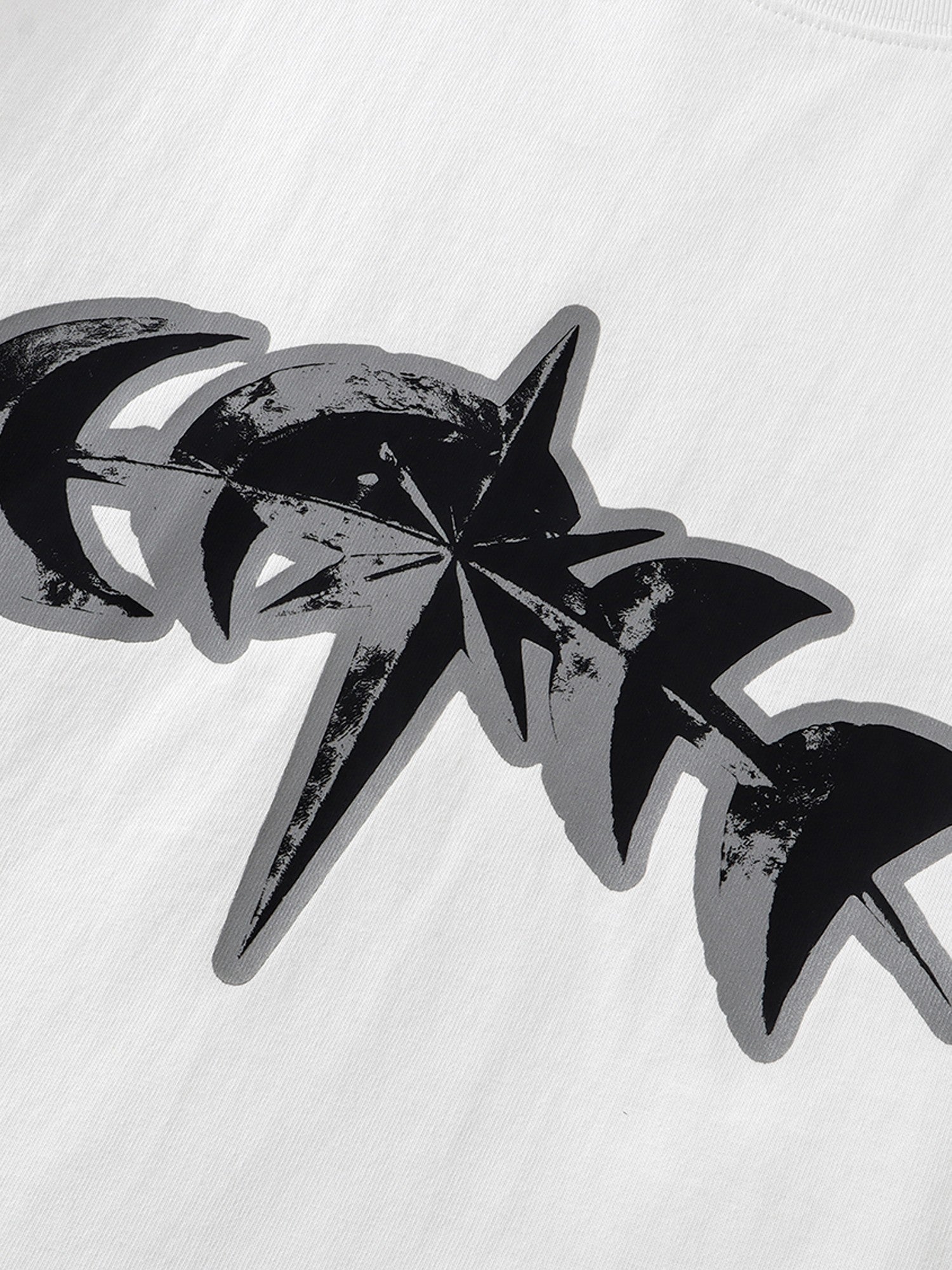 3M reflective astral star graphic close-up on White cotton