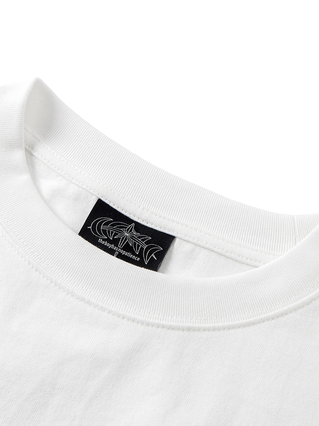 White long-sleeve tee ribbed crew neck and astral woven label