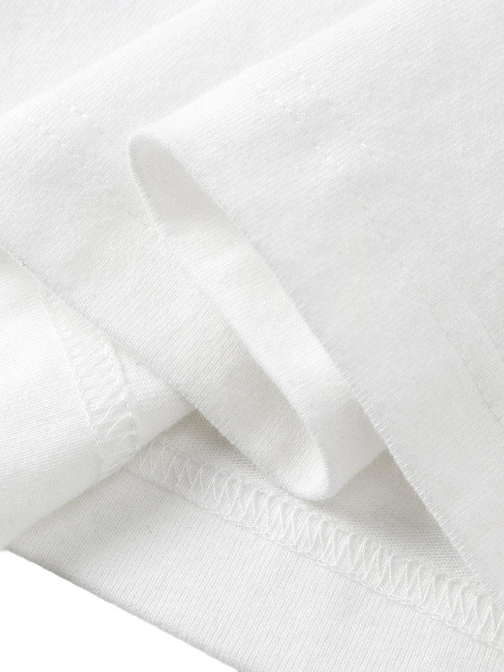 White long-sleeve tee hem seam detail