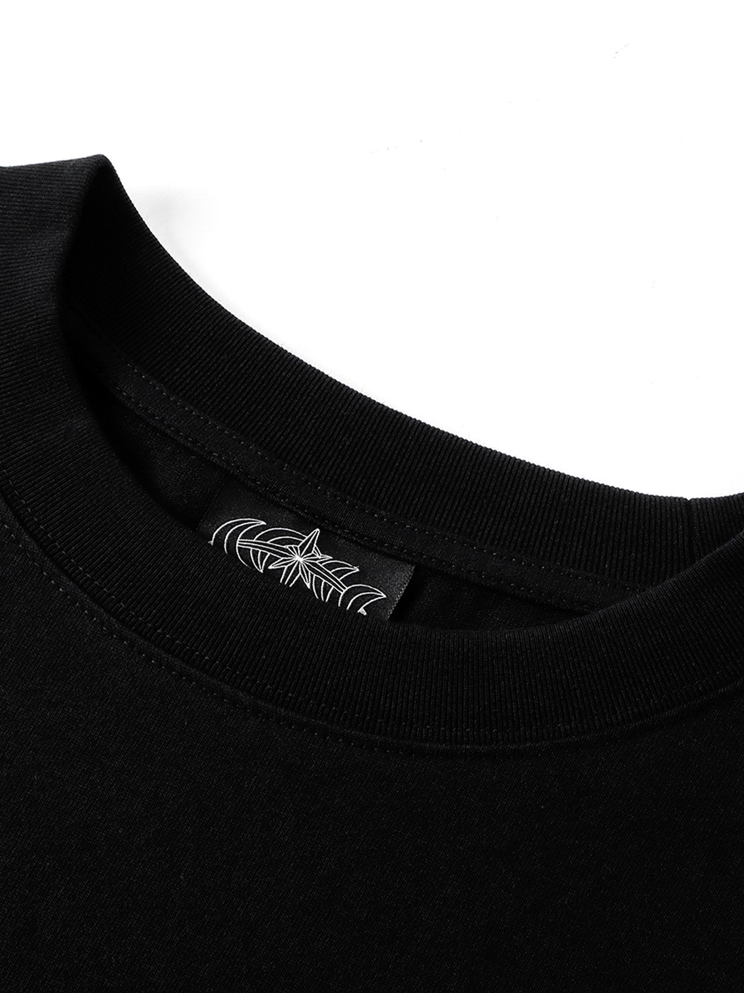 Black long-sleeve tee ribbed crew neck and astral woven label