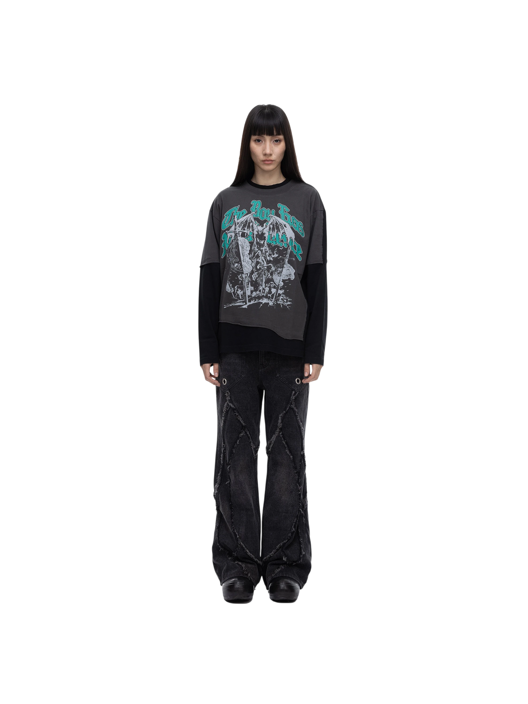 Model in TBHNP black knight long-sleeve tee, full-length front — men's streetwear tee