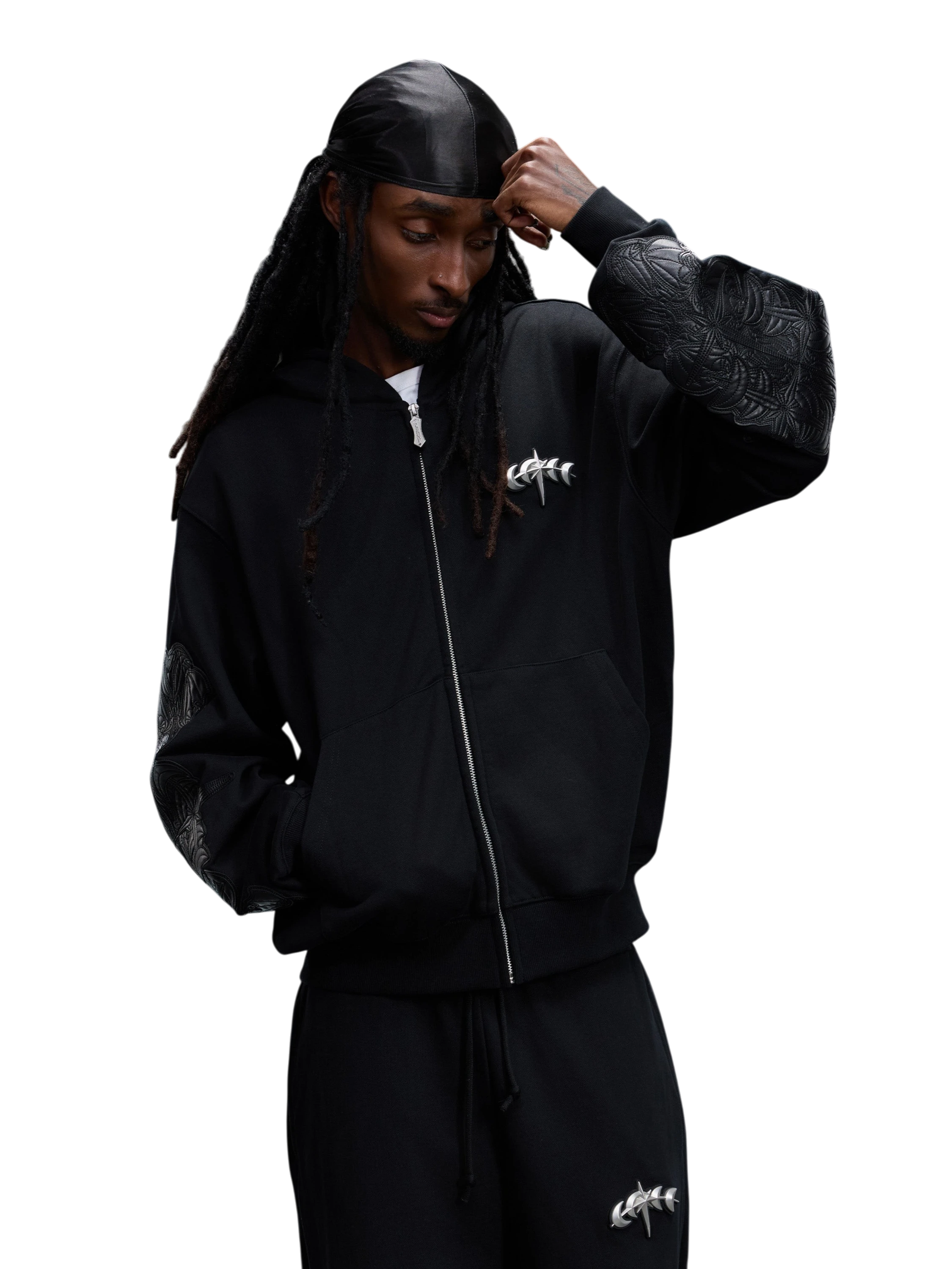 Close-up of the black hoodie sleeve leather patch.